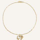 Collar Sagrado Corazón dorado Sonia Folache en oro 18k