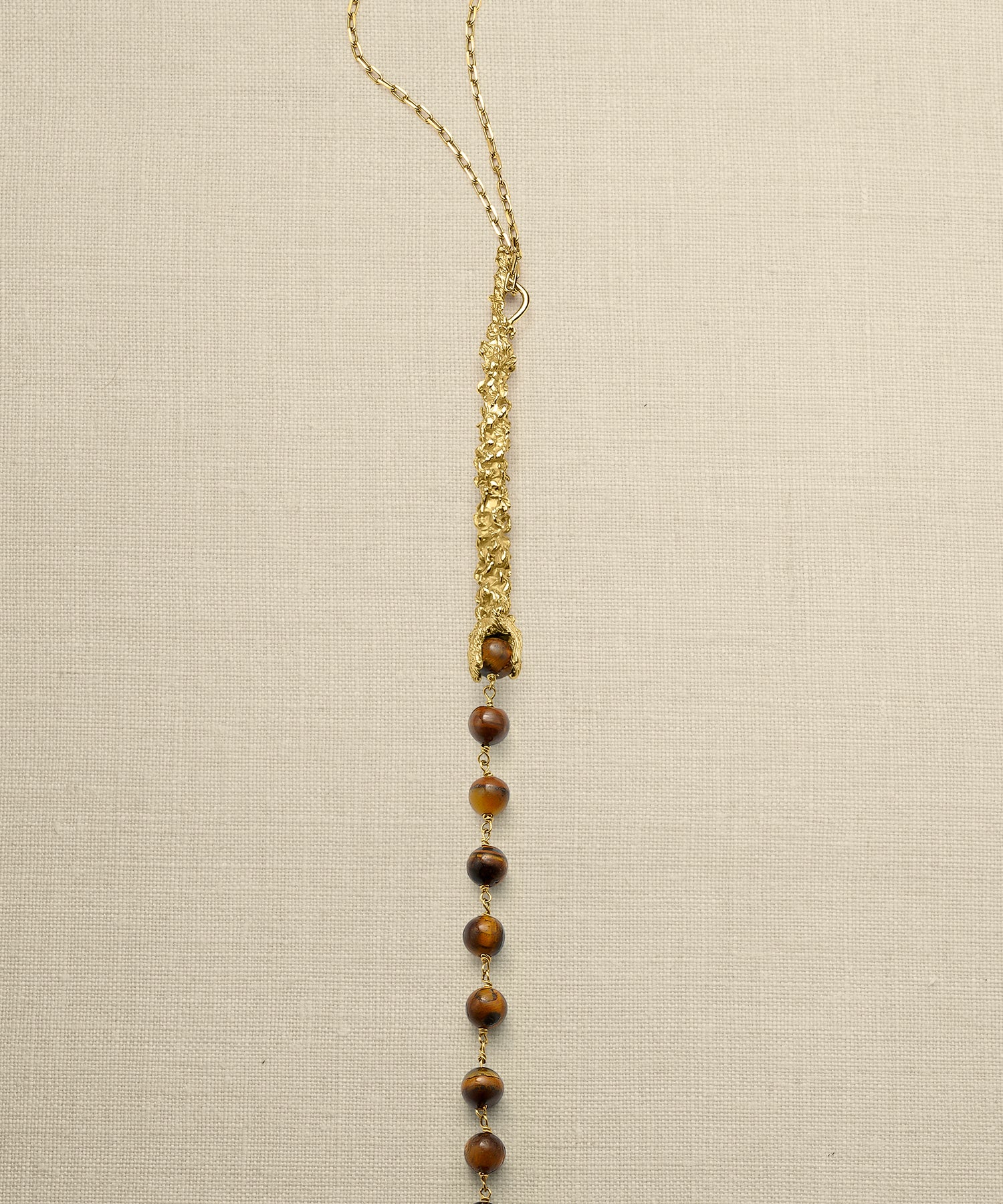 Sonia Folache Colgante Paloma Latón bañado en oro de 18k con Ojo de Tigre
